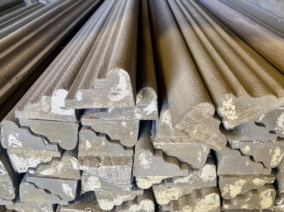 A pile of metal rods stacked showcasing materials for architectural foam fabrication in San Jose, CA